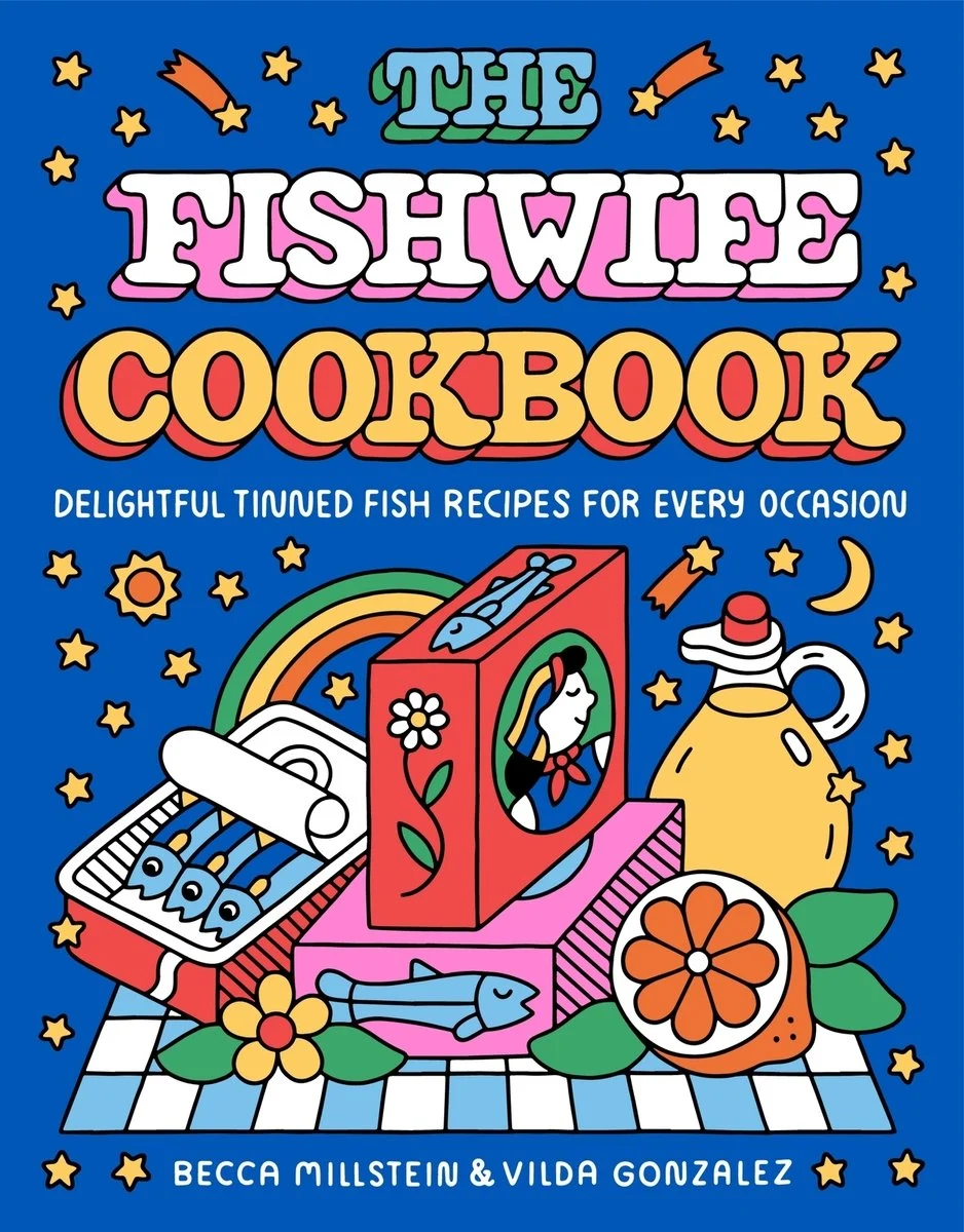 Colorful illustrated cover of "The Fishwife Cookbook" featuring tinned fish, a lemon, herbs, a teapot, and bold text. Authors: Becca Millstein & Vilda Gonzalez.