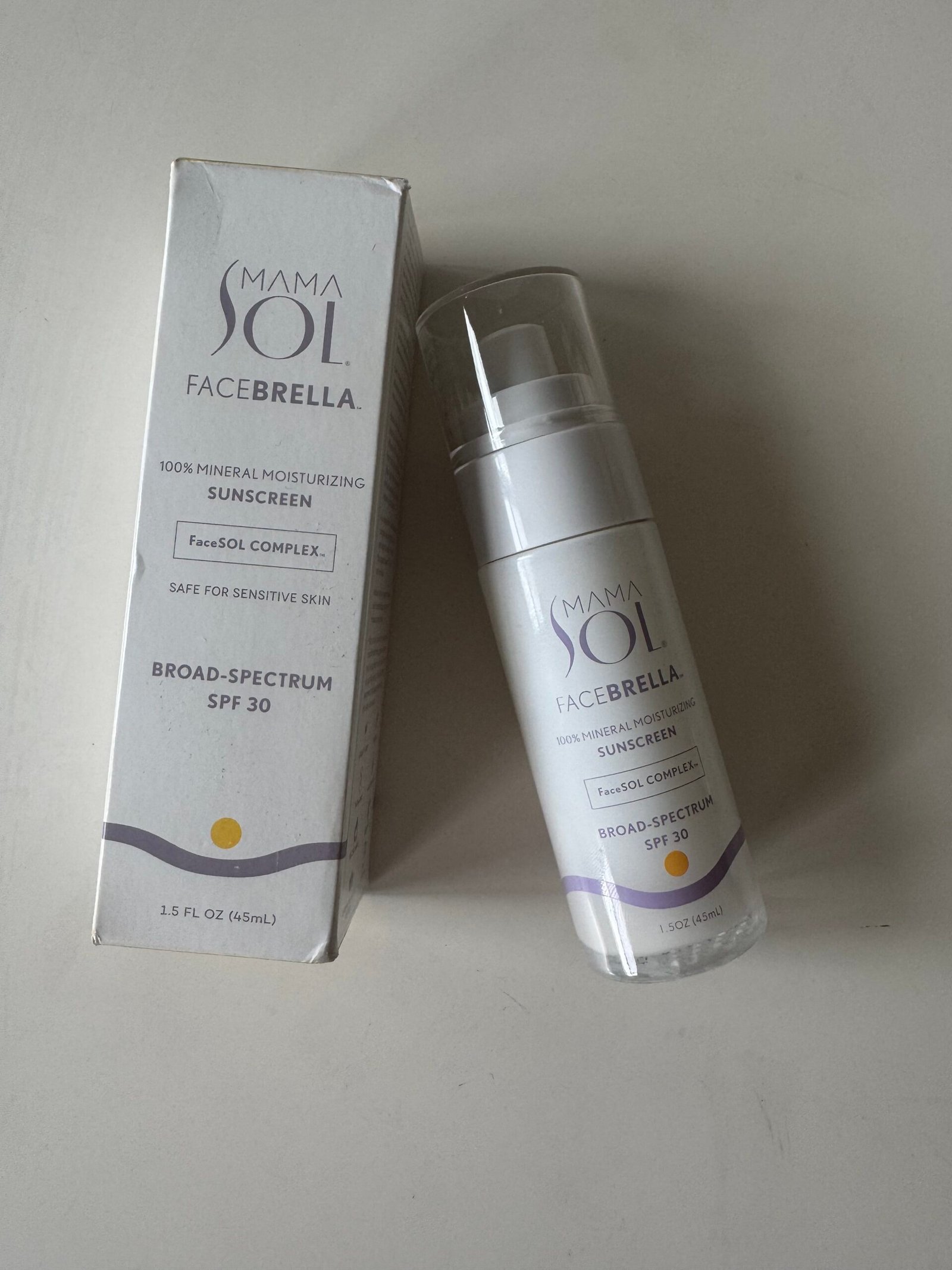Mama Sol Facebrella 100% Mineral Moisturizing Sunscreen SPF 30 bottle and box.