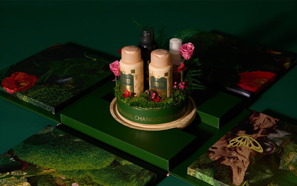We designed a telescopic rigid box for Wicked movie PR packaging.