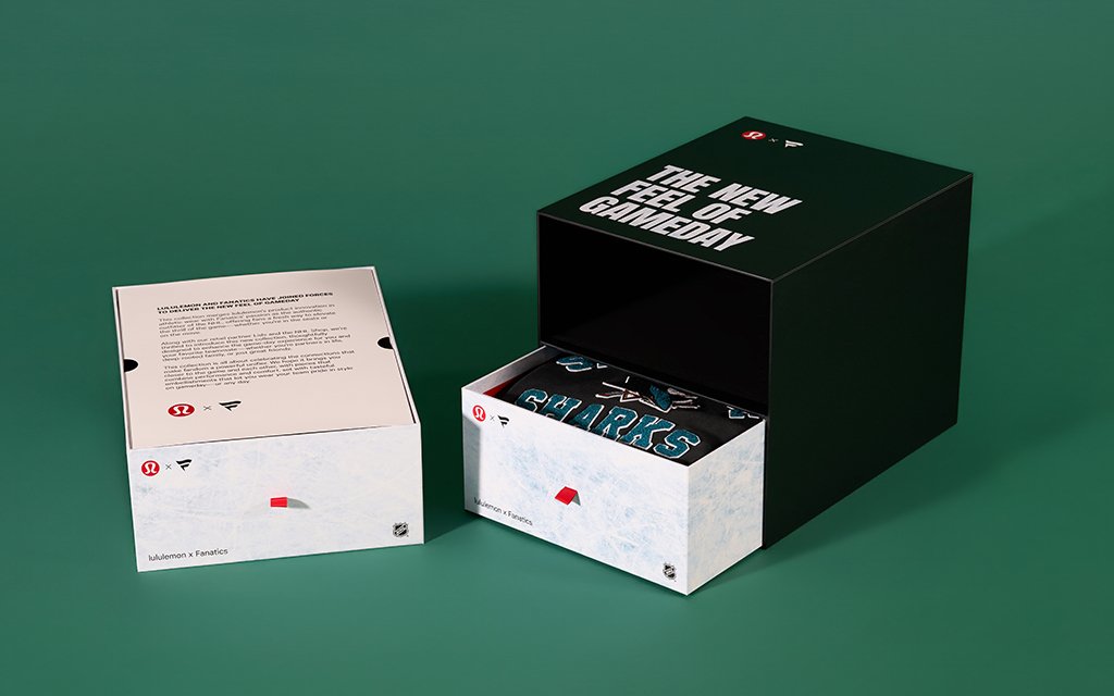 Double drawer box with pull-out trays showcasing multiple products in a layered presentation.
