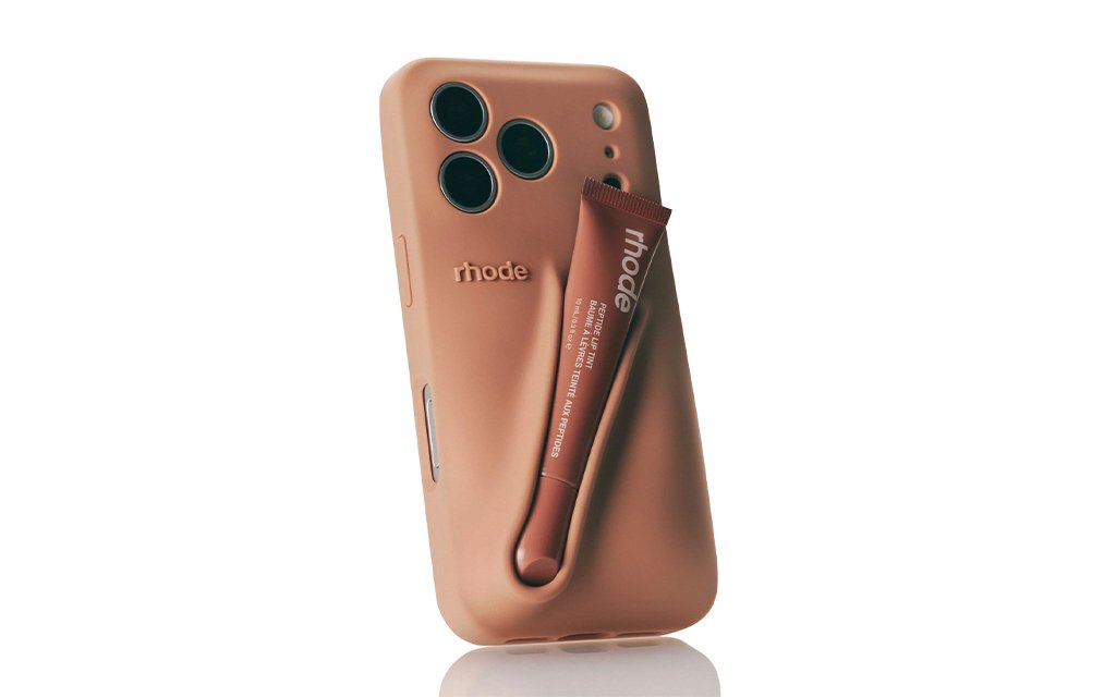 Rhode lip product packaging integrated into a silicone phone case accessory.