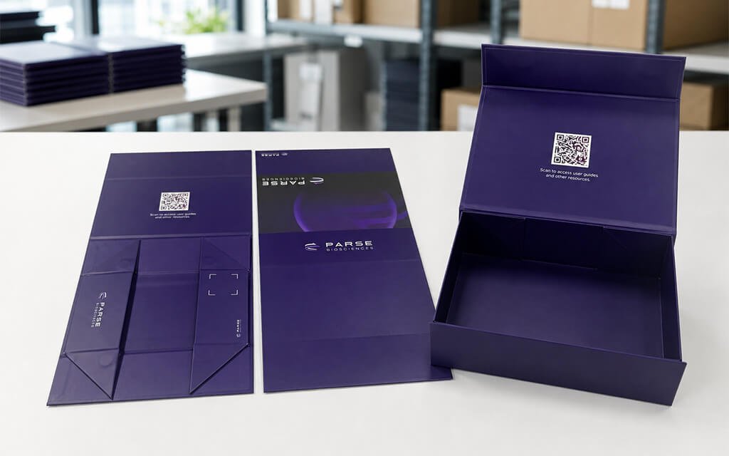 Collapsible rigid book box packaging design by Zenpack that reduces shipping and storage volume by 80%