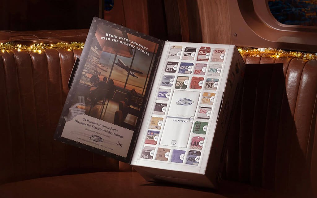 Flaviar packaging featuring a 100% recyclable paperboard structural insert replacing plastic foam