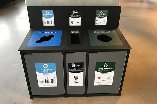 a trash, recycling, and compost bin