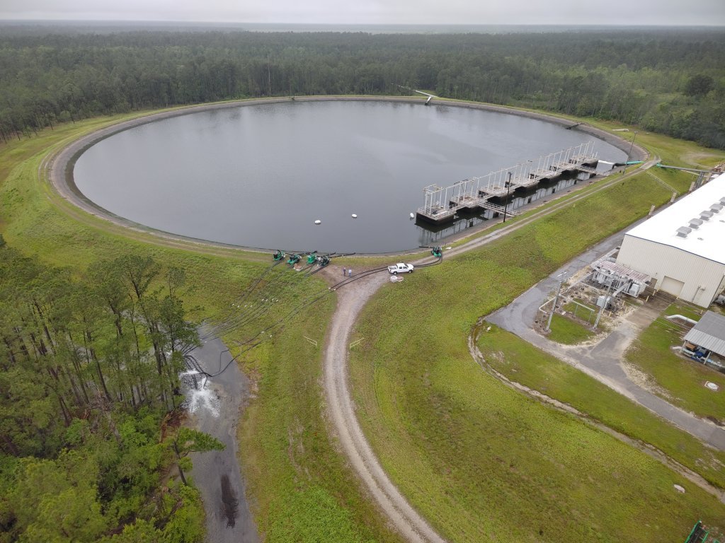 A drone image of the reservoir on May 7, showing a noticeably lowered water level as part of the 40‑million‑gallon pump‑out for upgrades.
