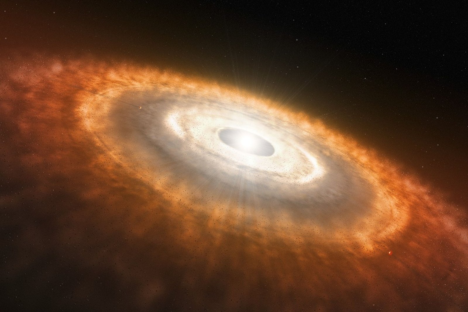 The image is dominated by a dusty disk extending from upper left to lower right and tilted toward the viewer.  It resembles patchy clouds with small rocky bits scattered throughout. At 4 o’clock and 11 o’clock are two small, embedded planets. The outer edges of the disk are reddish, the middle orange, and the inner region yellow-white. At the center is a gap within which is a bright white star.