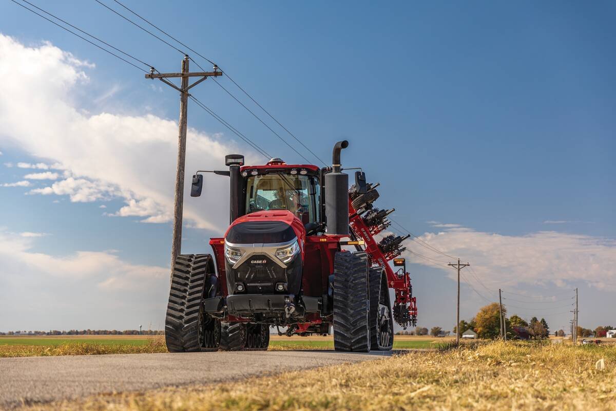 A Steiger 475 Rowtrac tractor pulls a folded Case IH
Nutri-Tiller 1030.
