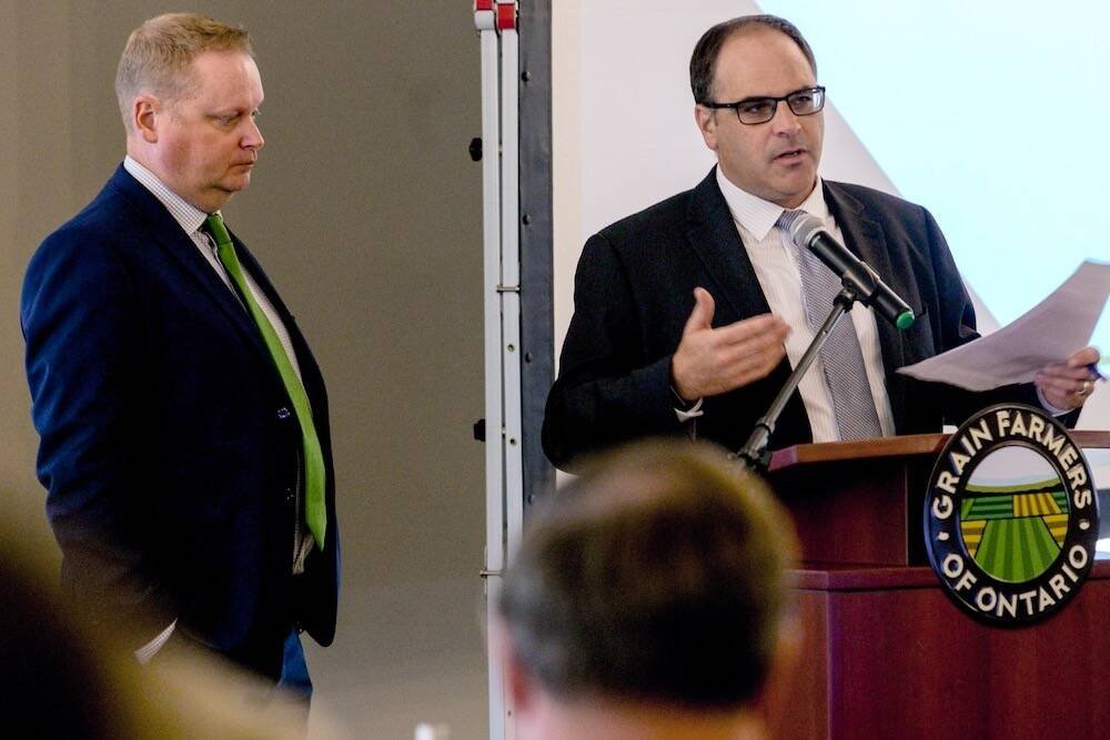 Crosby Devitt, Grain Farmers of Ontario’s CEO, right, speaks at a past annual meeting. Photo: File