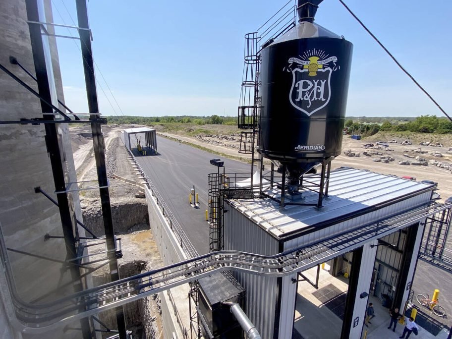 Incoming trucks stop at the probe building, far left, to have the grain checked, weighted and graded, before depositing the wheat, corn or soybeans, beside the silos where they are transported into silos or directly onto a waiting ship. Photo: Diana Martin