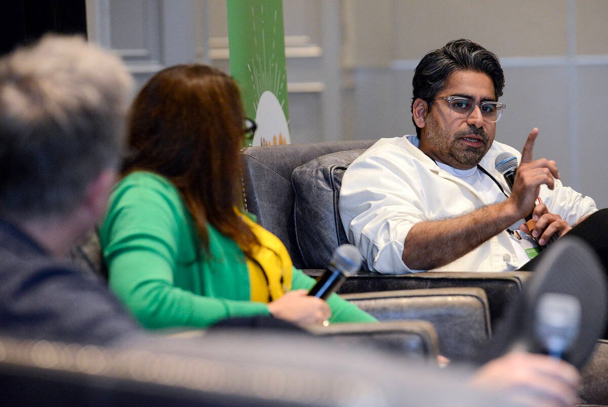 Aamir Malkani, Plant Up, far right, explains the challenges new manufacturers face in scaling operations to Richard LaBonte, Roquette, left, and Margaret Hughes, Avena Foods, centre, during Plant-Based Foods of Canada’s annual general meeting. Photo: Diana Martin