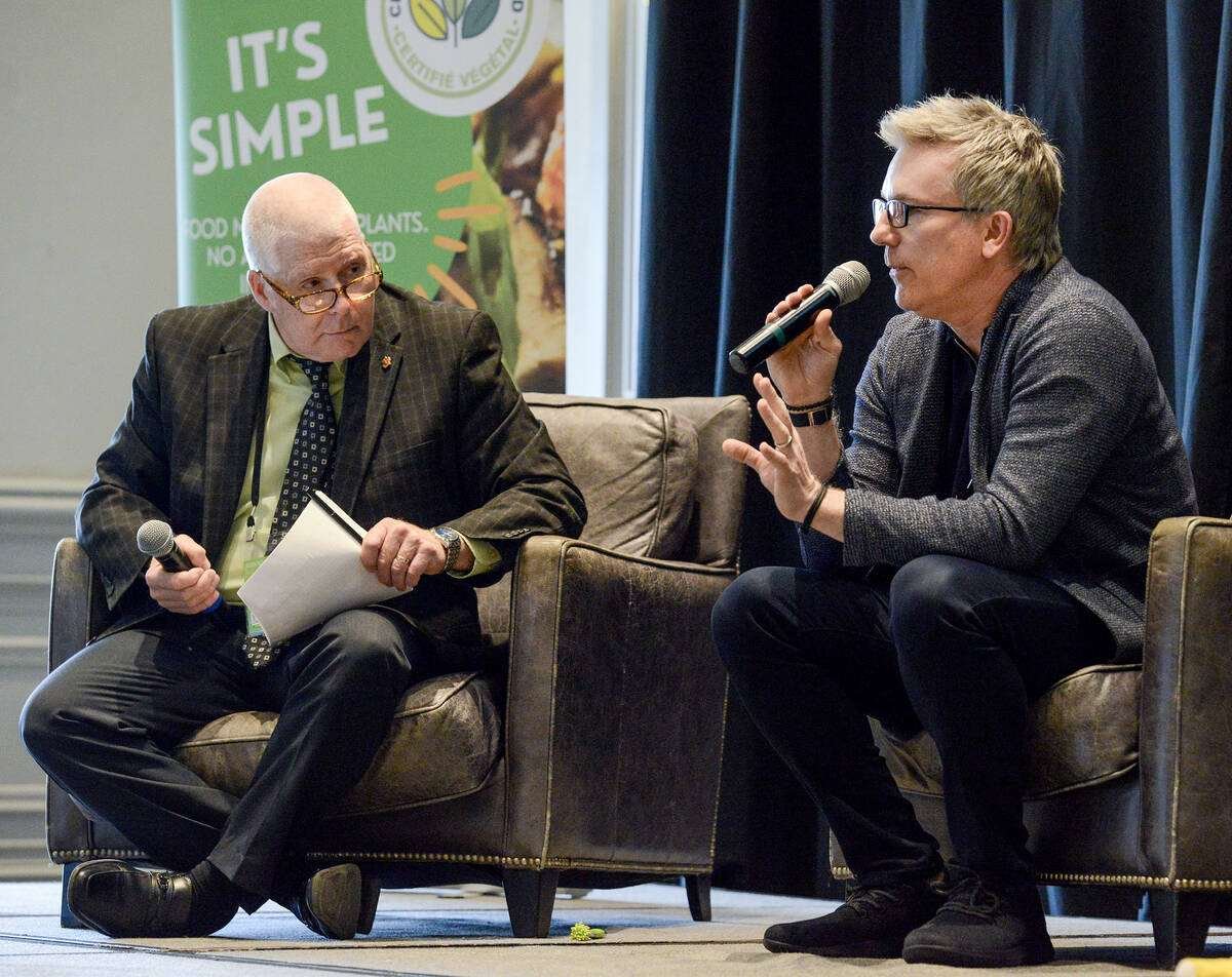 Panel moderator, Al Mussell, Agri-Food Economic Systems founder and research lead, left, listens as Richard LaBonte, Roquette’s head of marketing for the Americas, explains how investment in creating grower certainty helps build a stable value chain for plant-based food production in Canada during Plant-Based Foods of Canada’s annual general meeting. Photo: Diana Martin