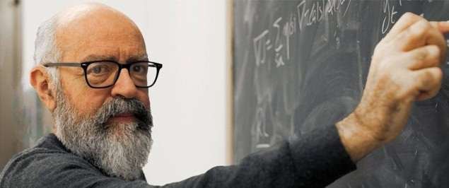 Photo of Antonio Celani at a blackboard