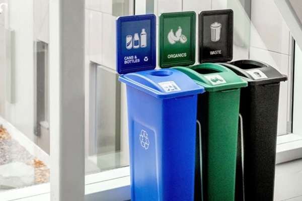 a recycling, trash, and compost bin
