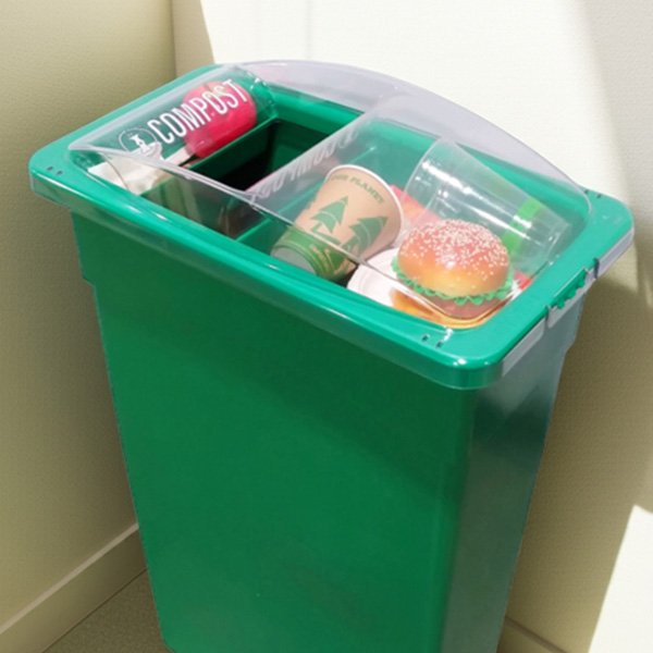 a compost bin with a clearly labeled lid