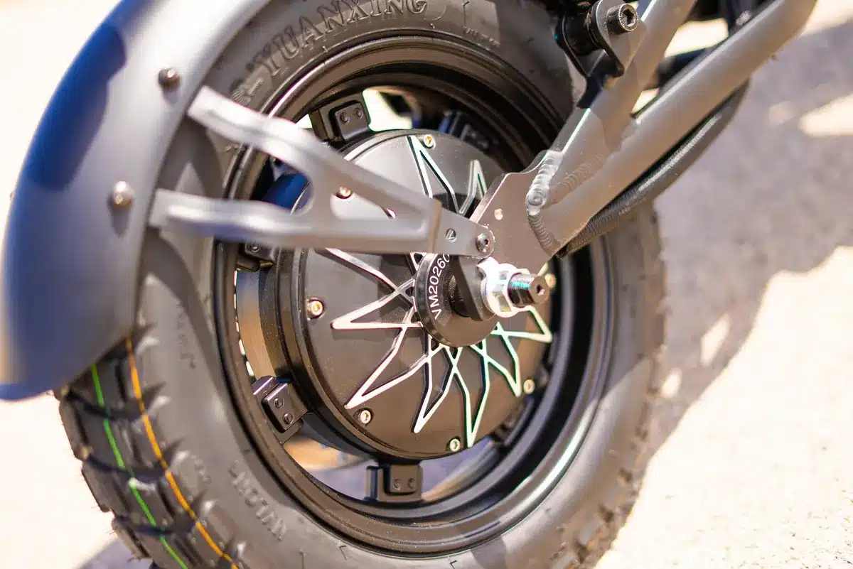 EMOVE RoadRunner Pro V2 Review: Surron Power in a Tiny, Stealthy Package 14 EMOVE RoadRunner Pro V2 rear hydraulic disc brake and 203mm rotor on the hub motor wheel