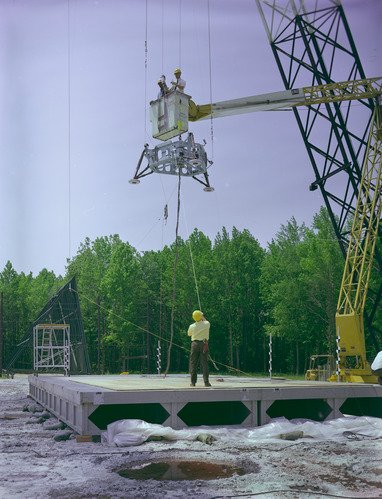 A full-scale Viking model is suspended in the air at NASA Langley's Landing and Impact Research Facility.