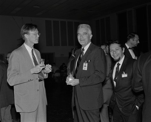 From left to right, Dr. Thomas Mutch, Brown University, James Martin, Viking Project manager; and Dr. Gerald Soffen, Viking Project scientist talk at a Viking Science Review.