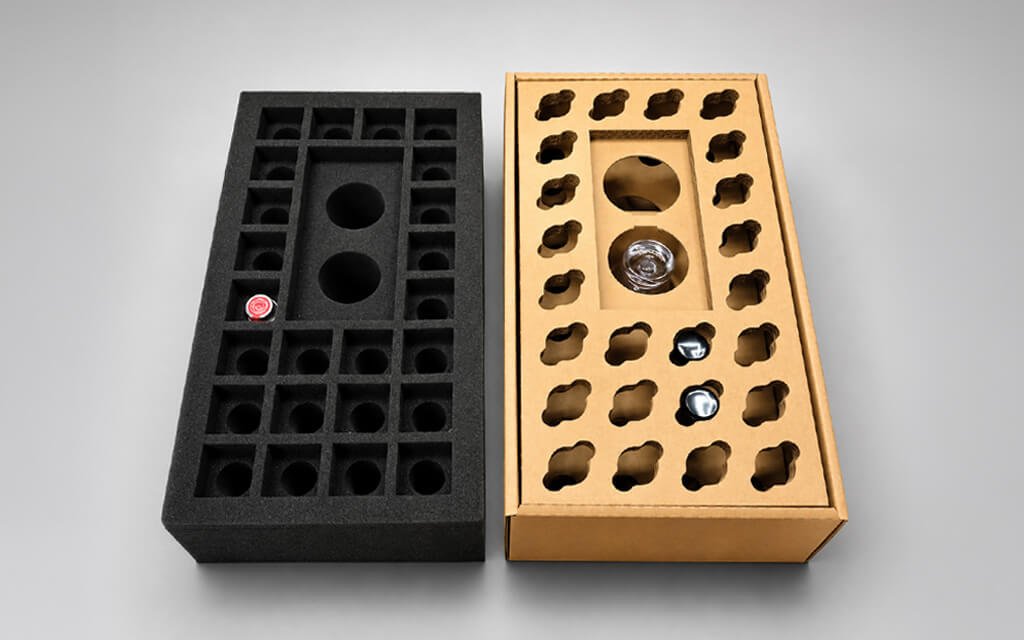 Flaviar EPR compliance packaging using flat-folded corrugated inserts to replace foam by Zenpack.