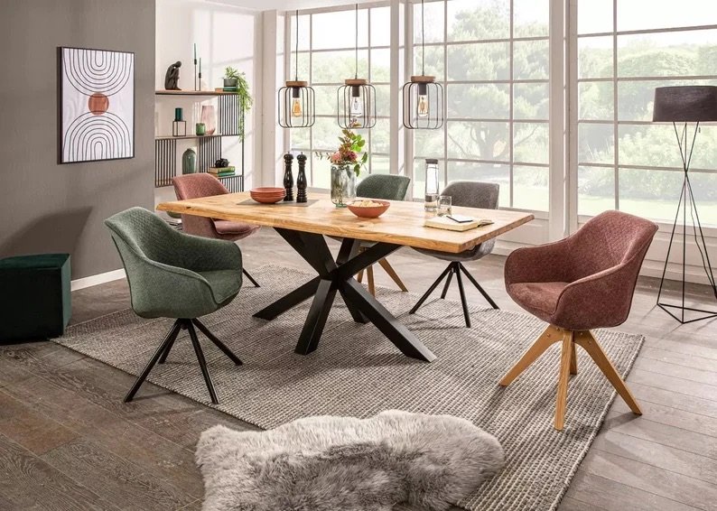 A wooden dining table set in a dining area from Mobello Furniture.