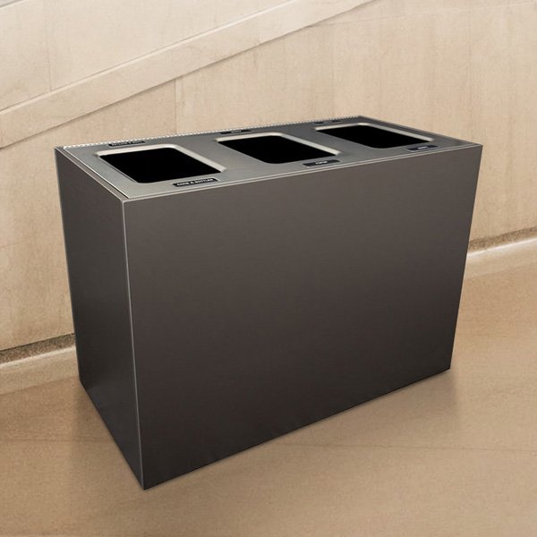 a three stream trash and recycling bin with labels to make sorting easy