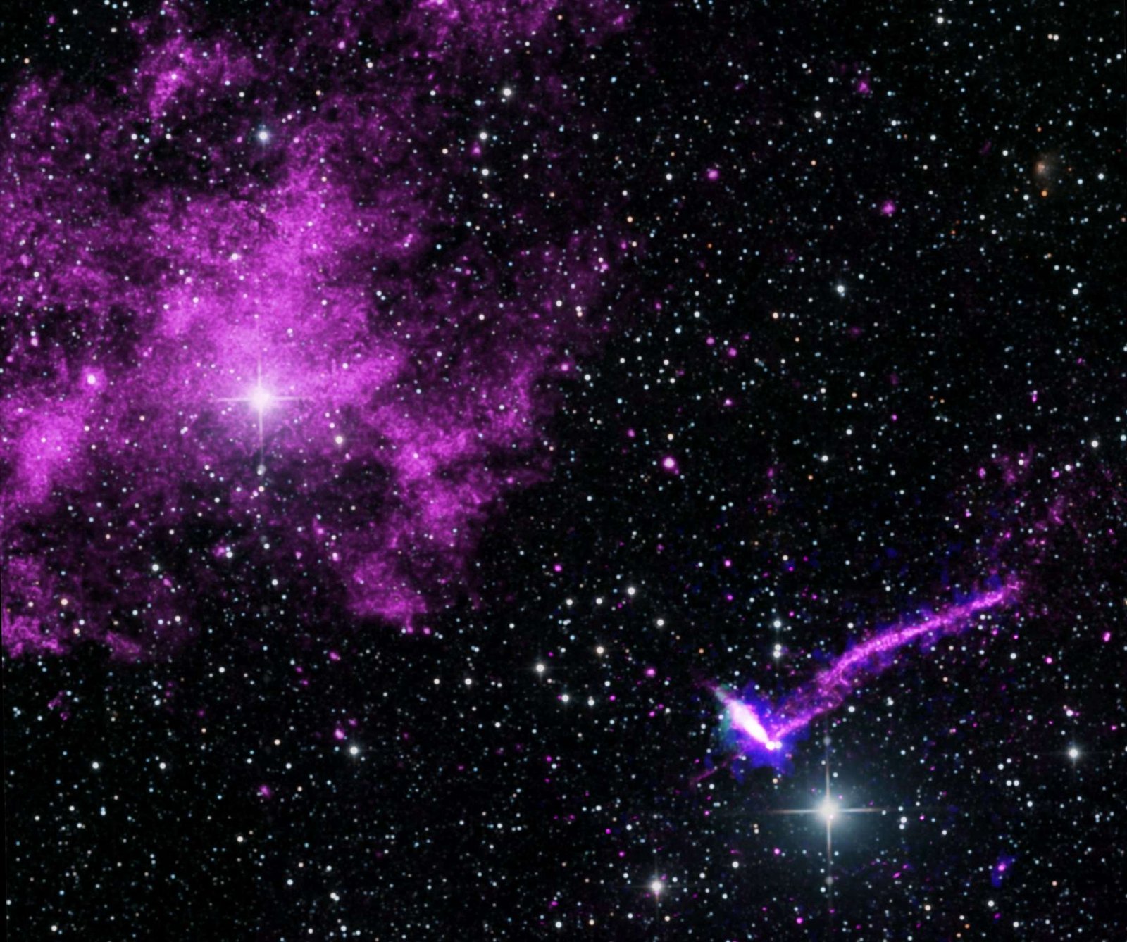 This composite multiwavelength image captures the turbulent environment surrounding the Lighthouse pulsar, set against a vast, black background speckled with twinkling white and faint green stars. In the upper-left quadrant, a massive, cloud-like nebula glows in a textured, vibrant purple hue, anchored by a prominent four-pointed star shining brightly near its center. Moving toward the lower-right quadrant, the pulsar itself is located at the lower tip of a concentrated, brilliant whitish-blue elongated point of light. Extending outward from its core is a long, narrow, and slightly curved jet of purple and blue emission that streaks upward and to the right. This jet represents a massive 37-light-year tail of high-energy particles trailing behind the rapidly spinning star as it plow through interstellar space. This composite image contains X-ray data from NASA's Chandra X-ray Observatory in purple, additional X-ray from NASA's IXPE in blue, and radio data from CSIRO in green. The starfield is optical data from the 2MASS survey.