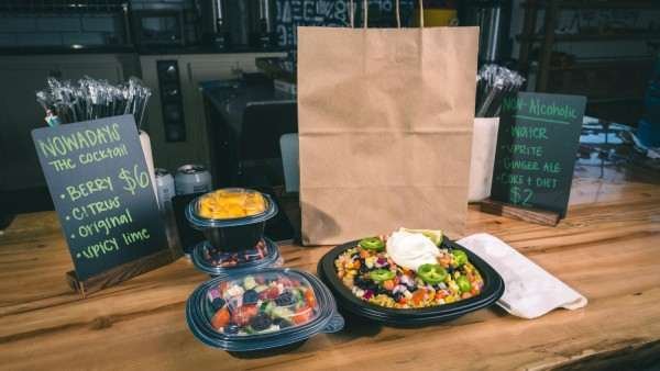 food containers on table at restaurant