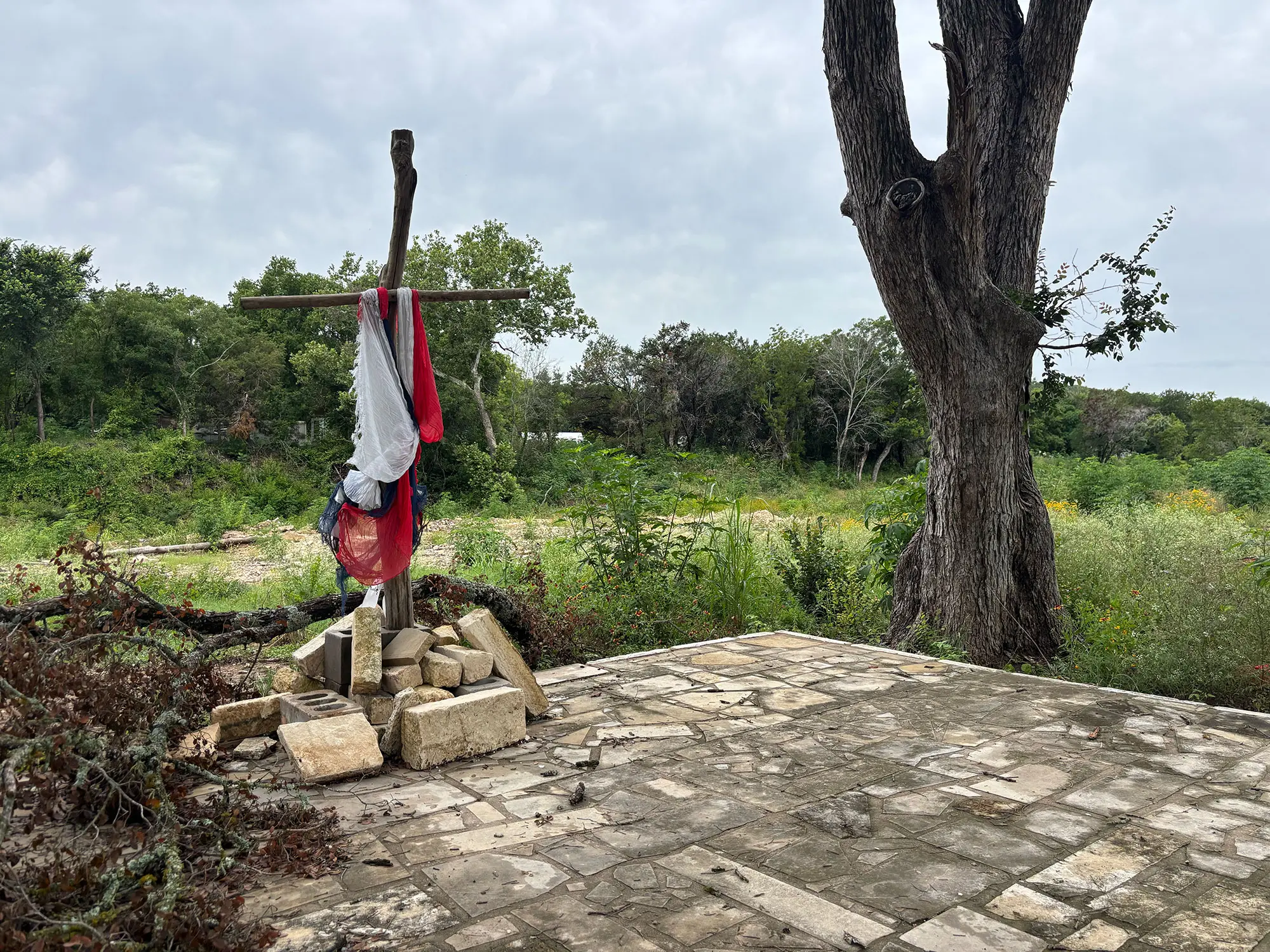 A Texas flag on an empty stone platform