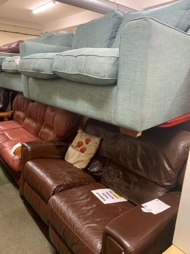 Second-hand sofas at a furniture reuse centre