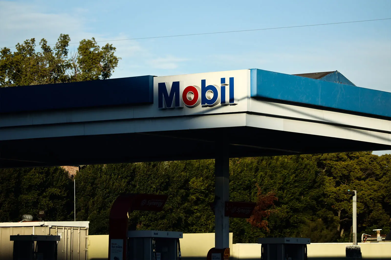 a mobile gas station awning, seen mostly in shadow