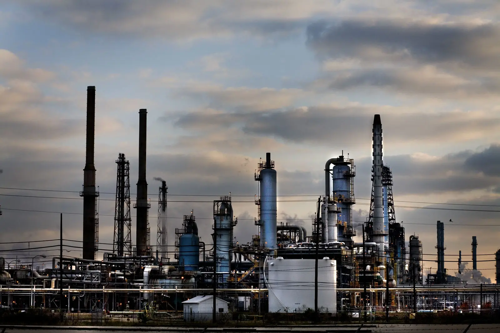 A gas refinery seen at sunset
