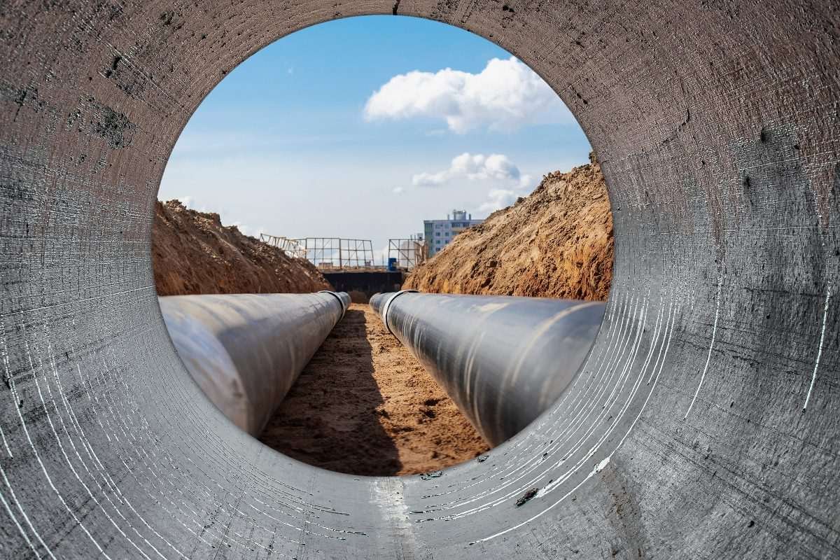 Large water supply pipelines being installed at a construction site