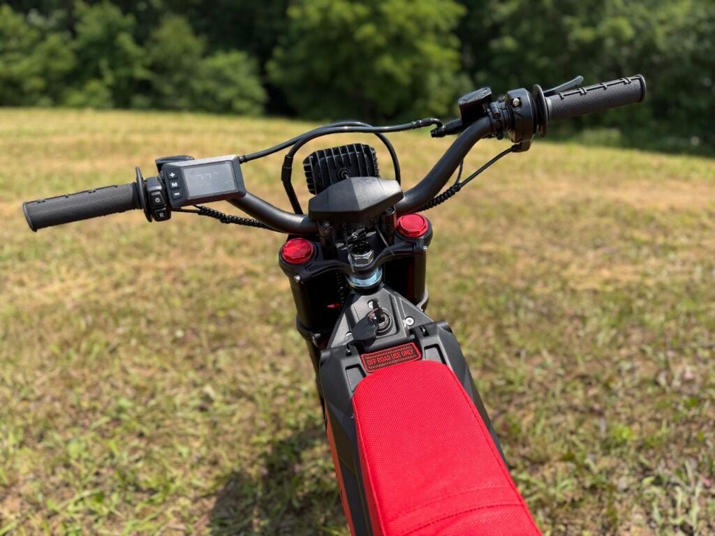 Yozma IN10 Pro Review: Is This $2,000 E-Dirt Bike a Real Sur Ron Killer? 6 Yozma IN10 Pro cockpit and handlebar controls