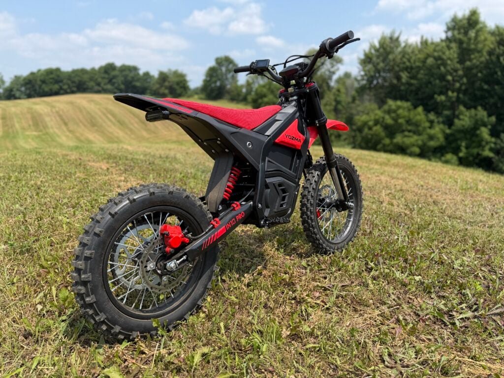 Yozma IN10 Pro Review: Is This $2,000 E-Dirt Bike a Real Sur Ron Killer? 7 Yozma IN10 Pro parked on a trail, rear view