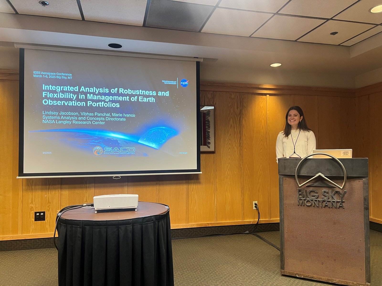Lindsey Jacobson presents NESSIE's work on managing Earth-observing mission portfolios at the 2025 IEEE Aerospace Conference