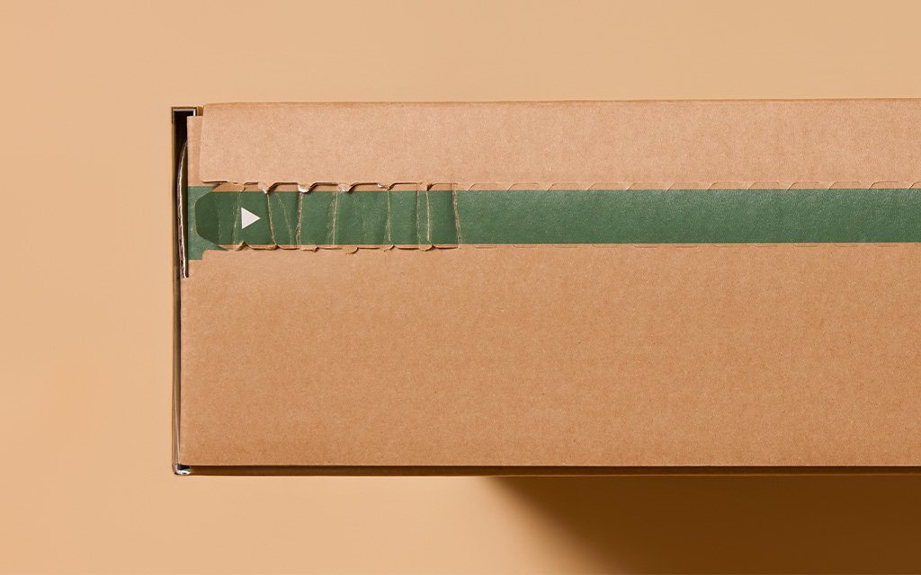Custom cardboard zipper strip designed for seamless opening, showcasing premium packaging engineering by Zenpack
