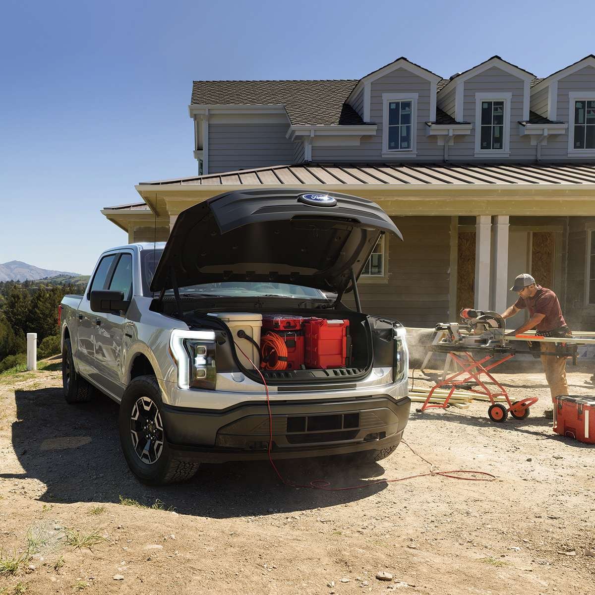 Ford F-150 Lightning electric pickup truck powering a construction site.