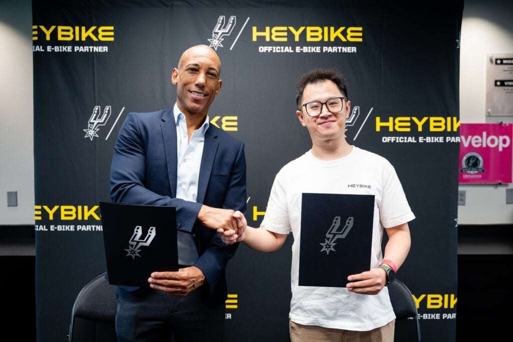 Heybike Becomes Official E-Bike Partner of the San Antonio Spurs 1 Spurs SVP Brian Colbert and Heybike COO Yifan Li shake hands at the Frost Bank Center after Heybike was named the team's official e-bike partner