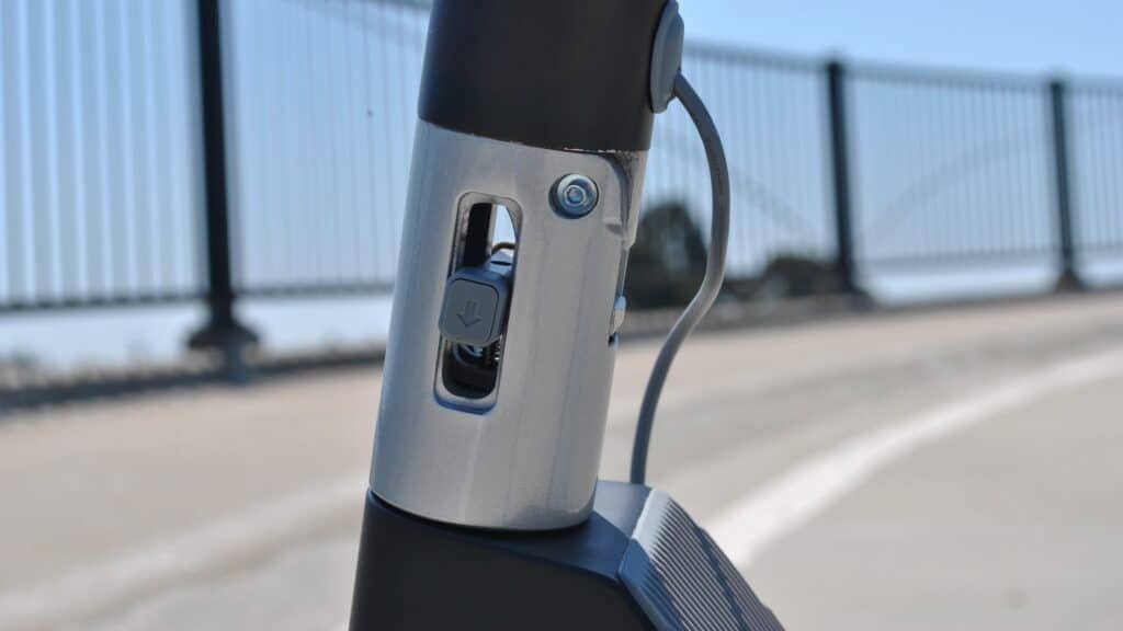Unagi Scooters in 2026: Why the Classic and Voyager Are Still Smart Buys 2 Unagi Model One one-touch folding latch on the stem