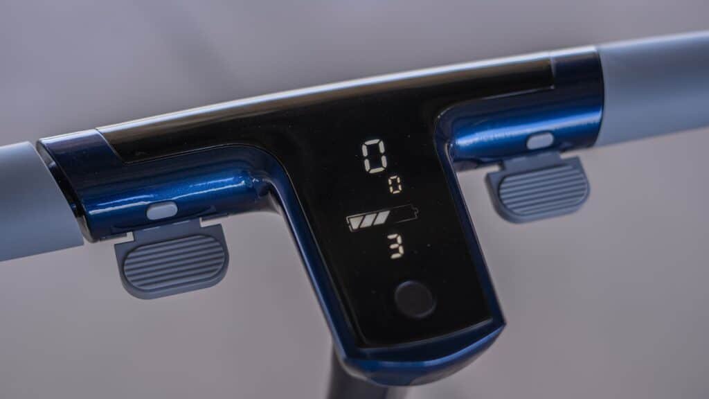 Unagi Scooters in 2026: Why the Classic and Voyager Are Still Smart Buys 3 Dedicated thumb regenerative brake paddle on the Unagi Model One handlebar