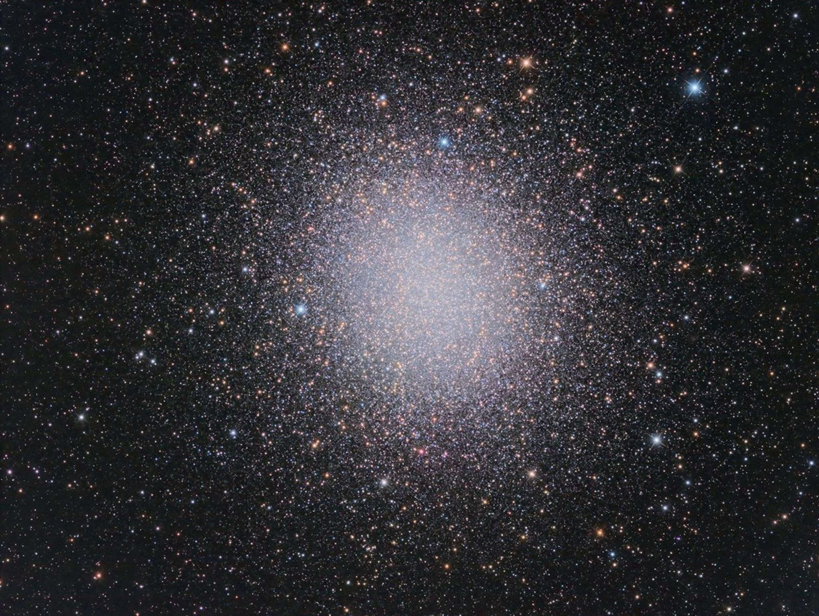 A dense globular cluster of stars.