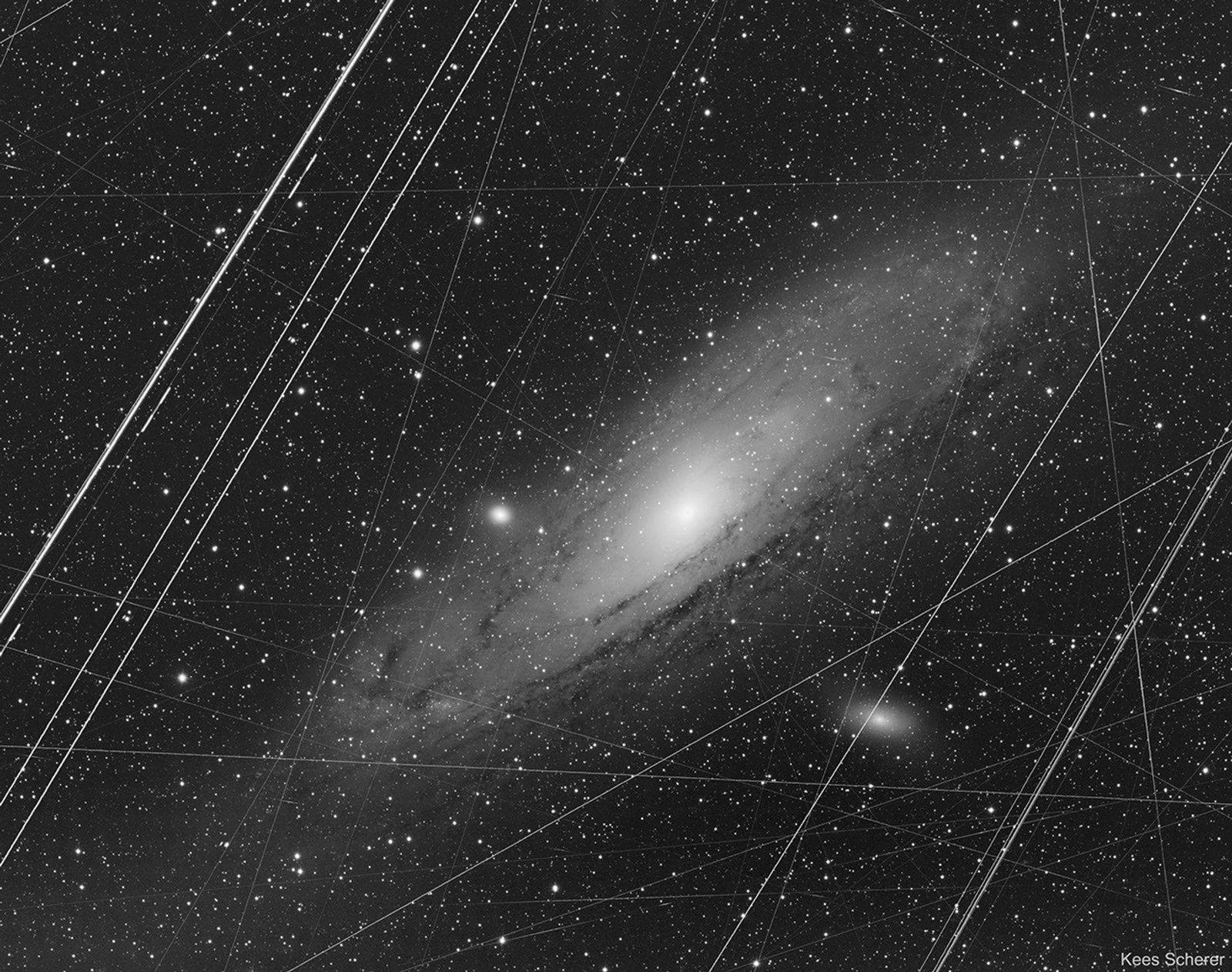 Before image of the Andromeda galaxy with streaks marring the field of view.