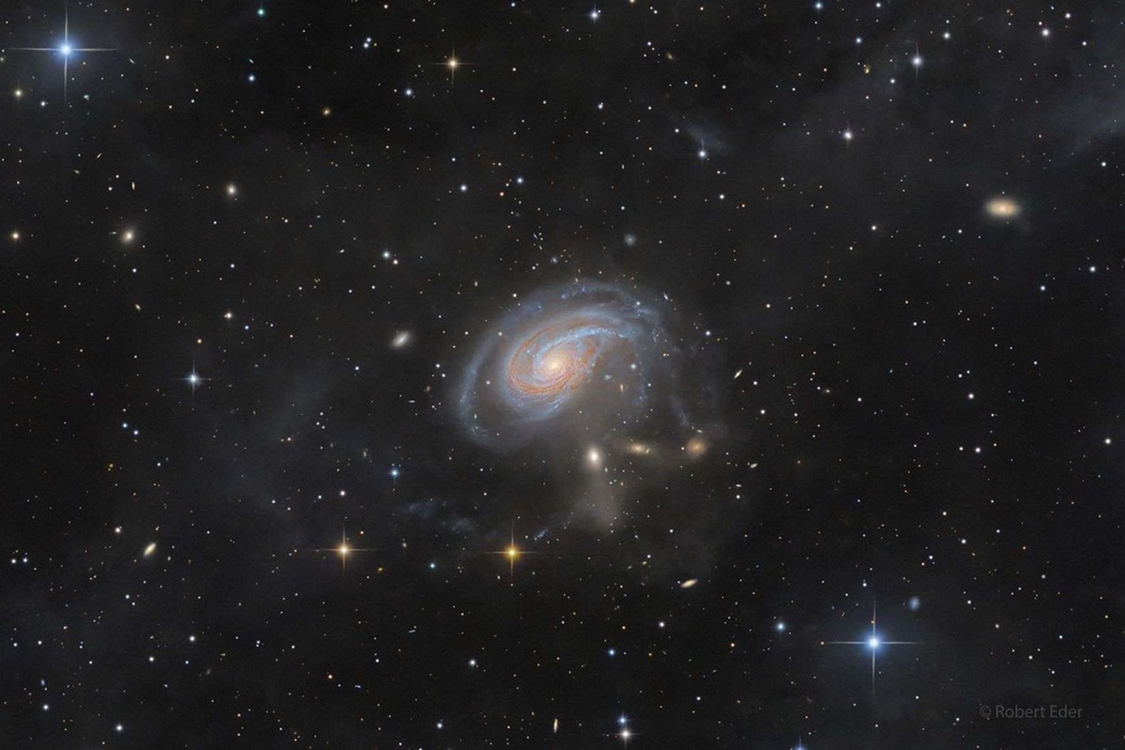 A spiral galaxy viewed face-on with an extended spiral arm.