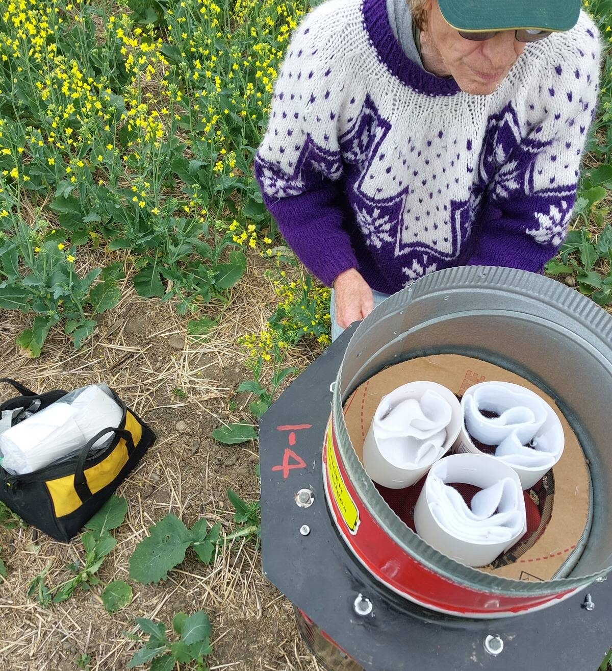 Paramoria AgriScience co-founder Byron Puchalski opens a Spornik to access the material used to collect airborne samples. Paramoria analyzes the samples for pathogens including sclerotinia, fusarium head blight and stripe rust. Photo: Courtesy Paramoria AgriScience