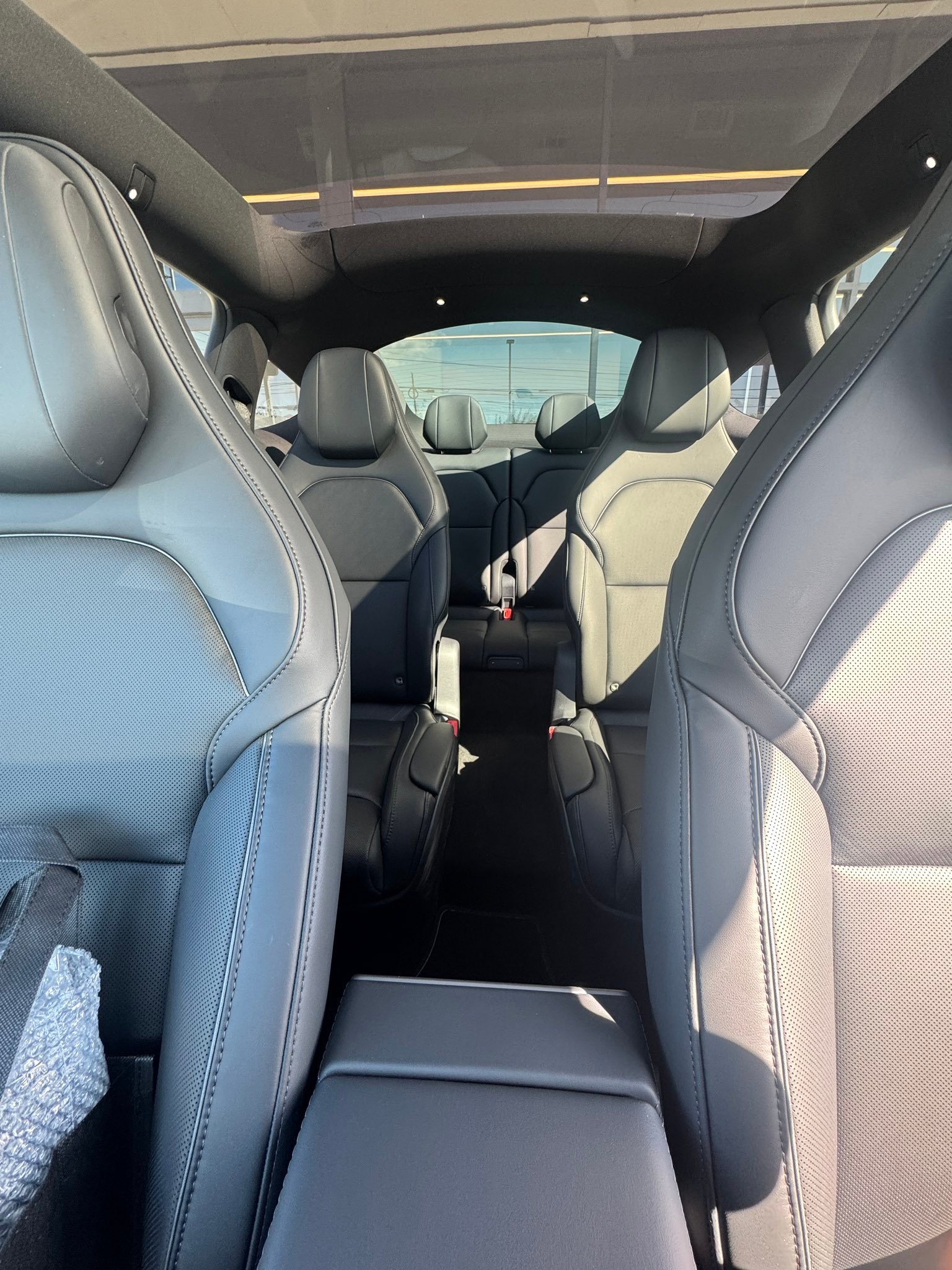 tesla model y l interior from driver's seat