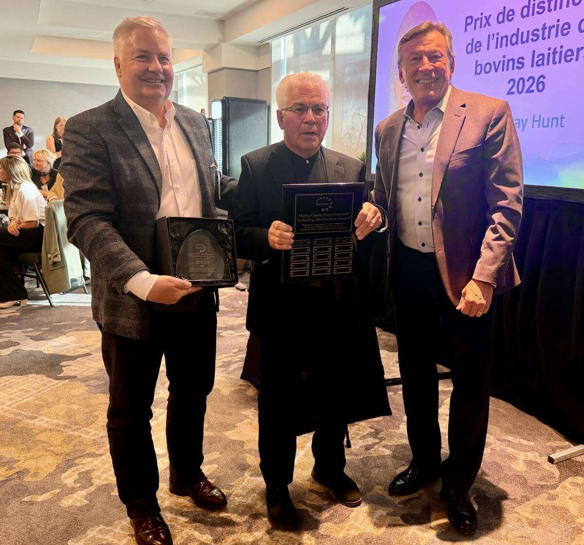 Neil Petreny, left, CEO of Lactanet, Murray Hunt, winner of the 2026 Dairy Cattle Industry Distinction Award and Paul Larmer, former CEO of Semex during the presentation of the award at the Lactanet Dairy Open Industry Forum. Photo: John Greig