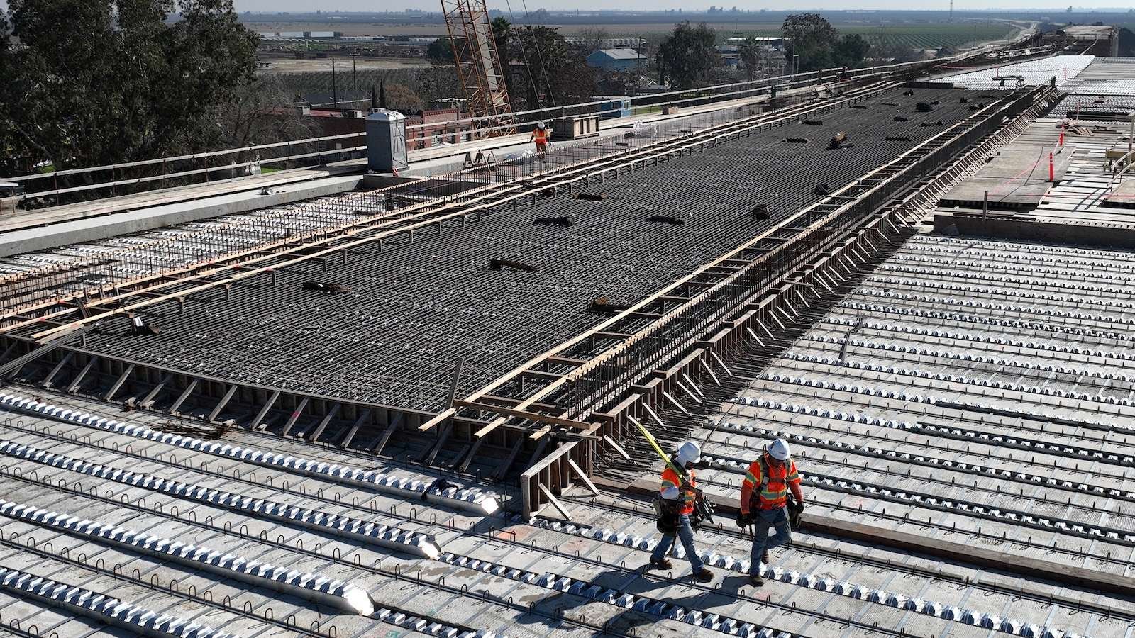 A construction crew works on a viaduct that will be part of the California high speed rail system.