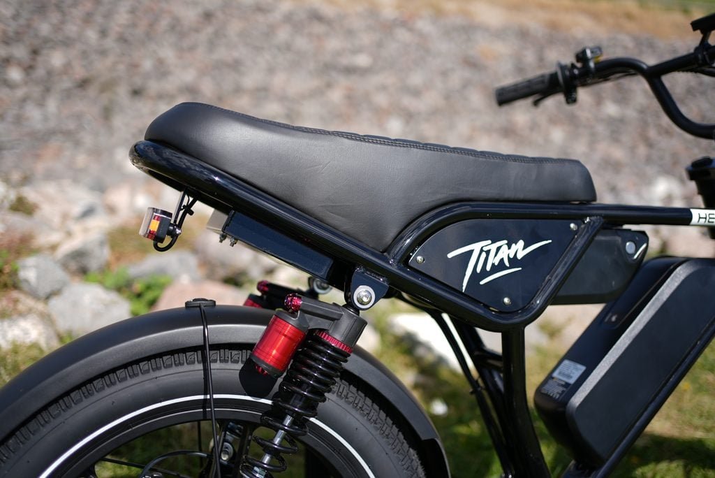 Heybike Titan Review: Street Legal, Built for Distance, and a Real Saturn Rival 2 Heybike Titan two-up saddle, rear spring shock and Titan side badge