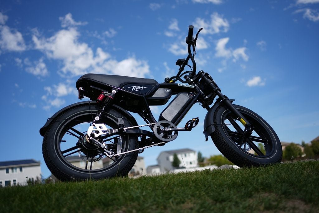Heybike Titan Review: Street Legal, Built for Distance, and a Real Saturn Rival 4 Low angle of the Heybike Titan showing the fat tires, chain drive and battery