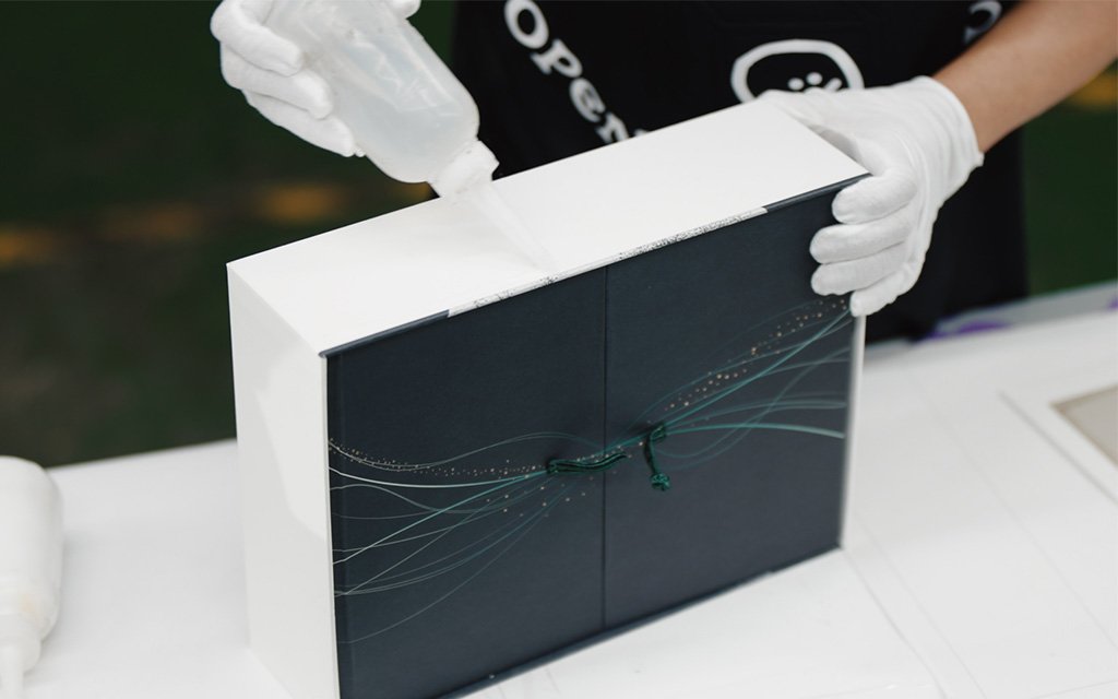 Handcrafted assembly process of custom Mid-Autumn Packaging Design ensuring precise structural alignment.