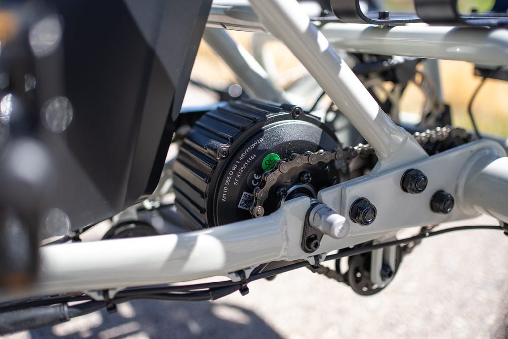 Lectric XP Trike 2 Review: A 750W Electric Trike Built for Stability 4 Close-up of the 750W rear hub motor and differential axle on the Lectric XP Trike 2